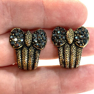 Vintage clip on earrings antiqued textured gold tone setting & gray rhinestones